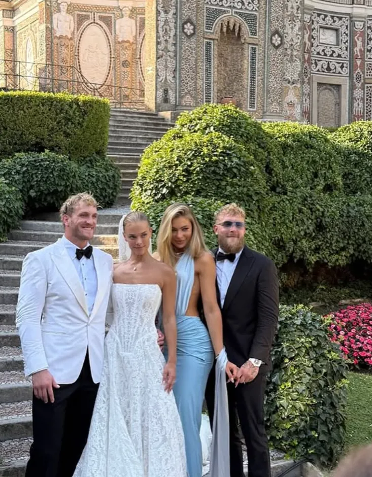 Galia Lahav bride Nina Agdal in strapless lace wedding dress Splendid posing with wedding guests Jutta Leerdam, Logan Paul and Jake Paul in formalwear at an Italian villa.