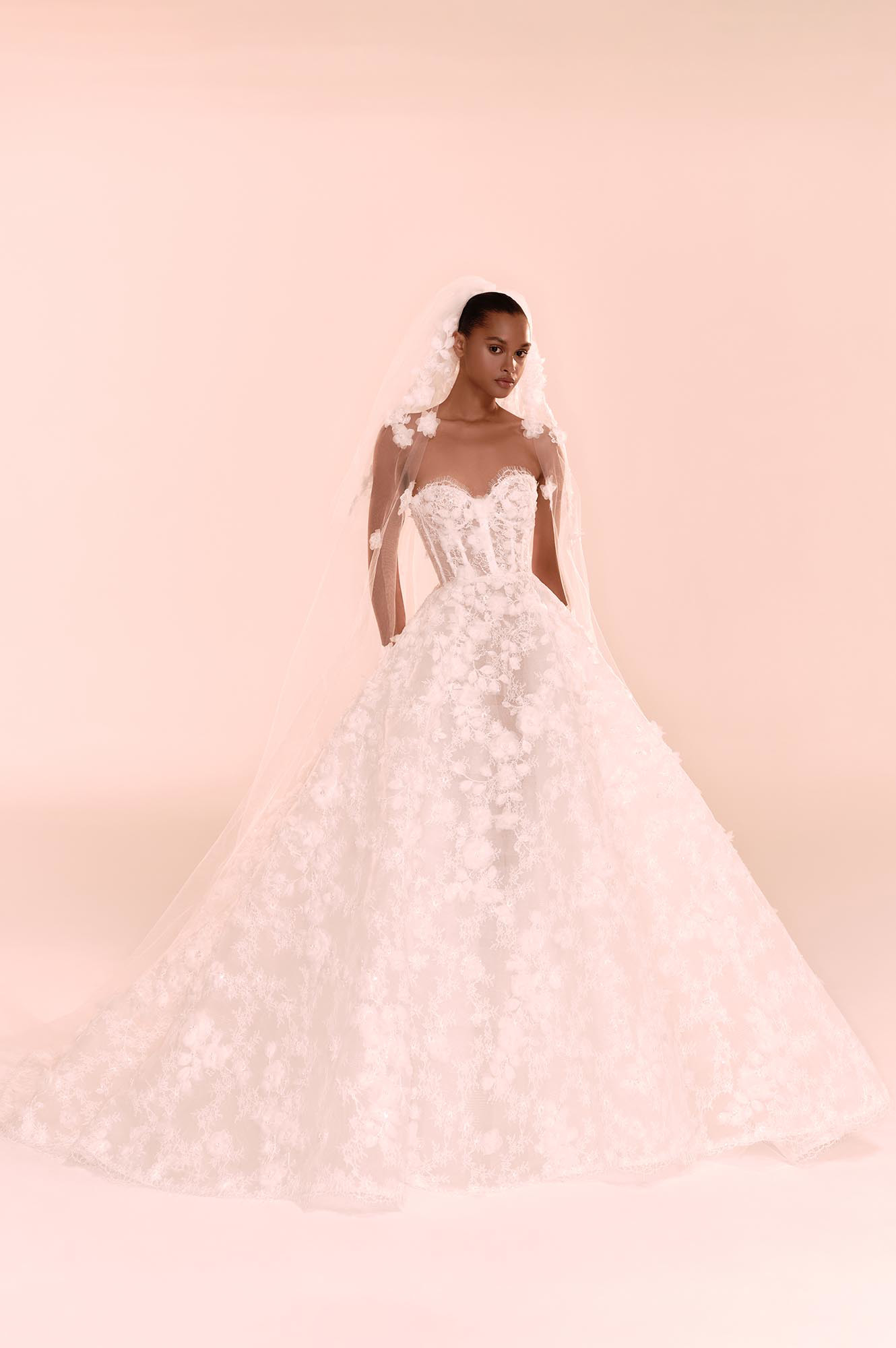 Zuhair Murad Mariage Fall 2026 Look 6 off-shoulder lace mermaid wedding dress with corset bodice and long sleeves