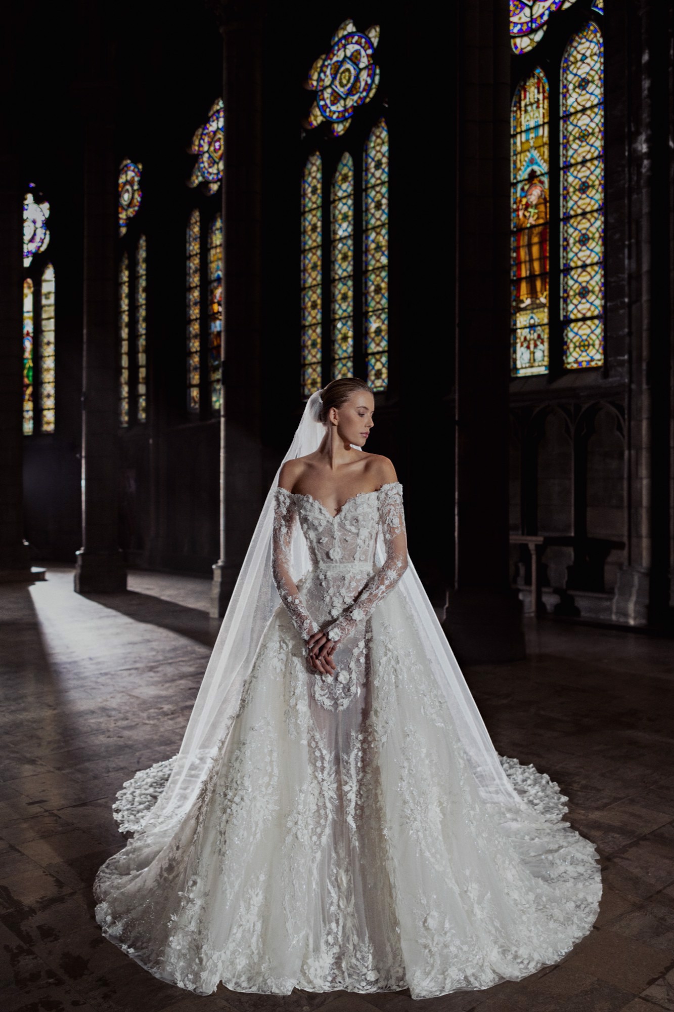 Zuhair Murad Mariage wedding dress Fall 2025 Look 1, lace wedding dress with overskirt, available at Bruidshuis Diana
