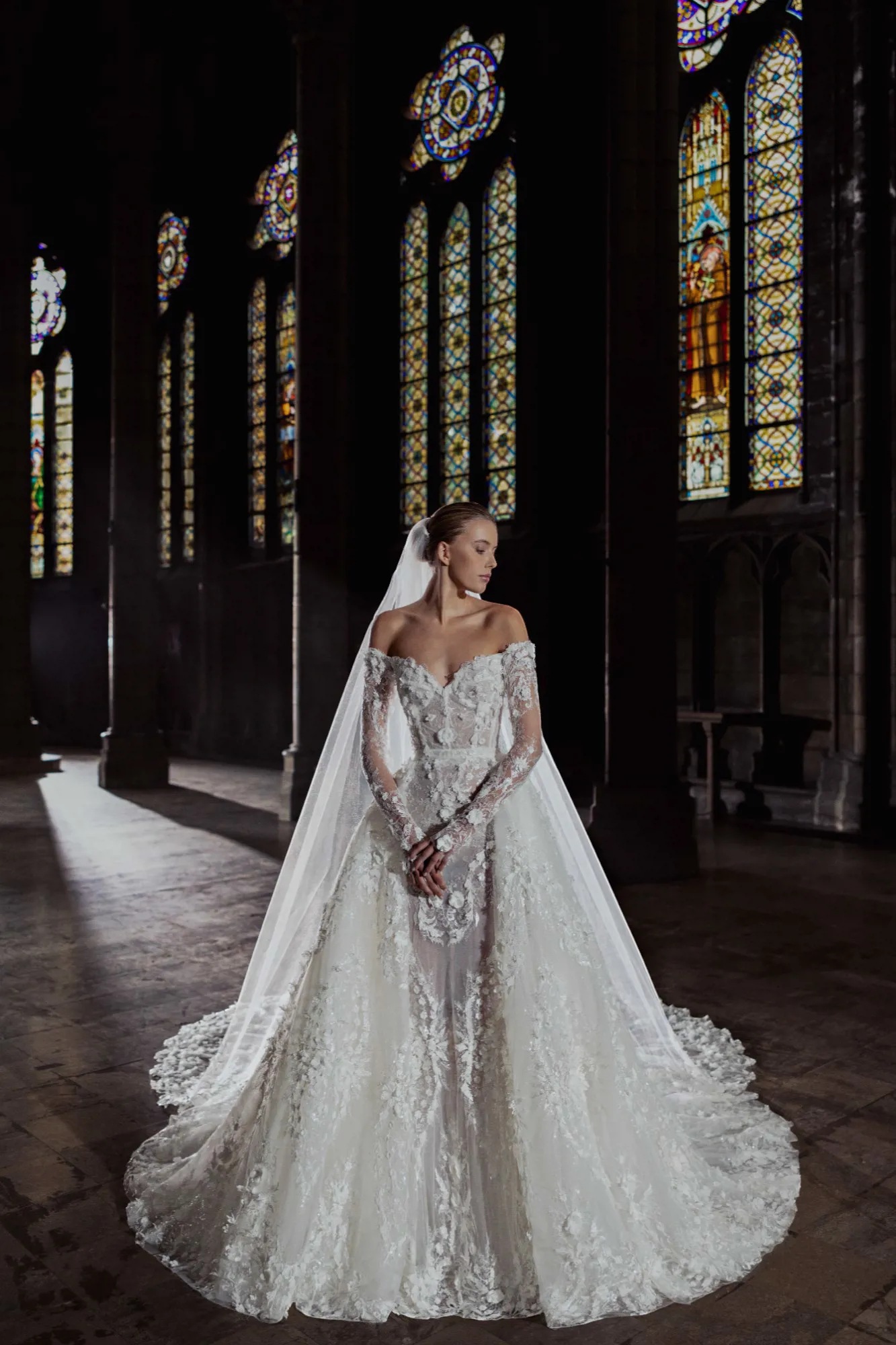 Zuhair Murad Mariage wedding dress Fall 2025 Look 1, lace wedding dress with overskirt, available at Bruidshuis Diana