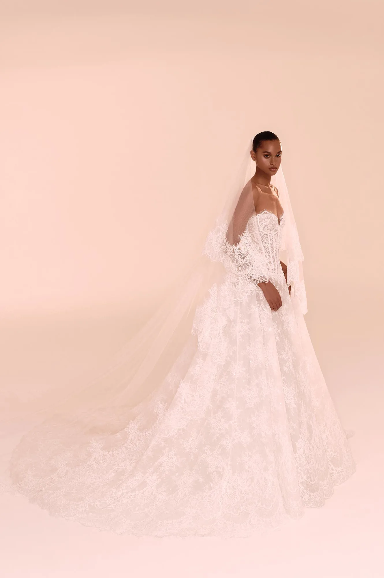 Zuhair Murad Mariage Fall 2026 Look 27 strapless lace ball gown wedding dress with long veil and dramatic train