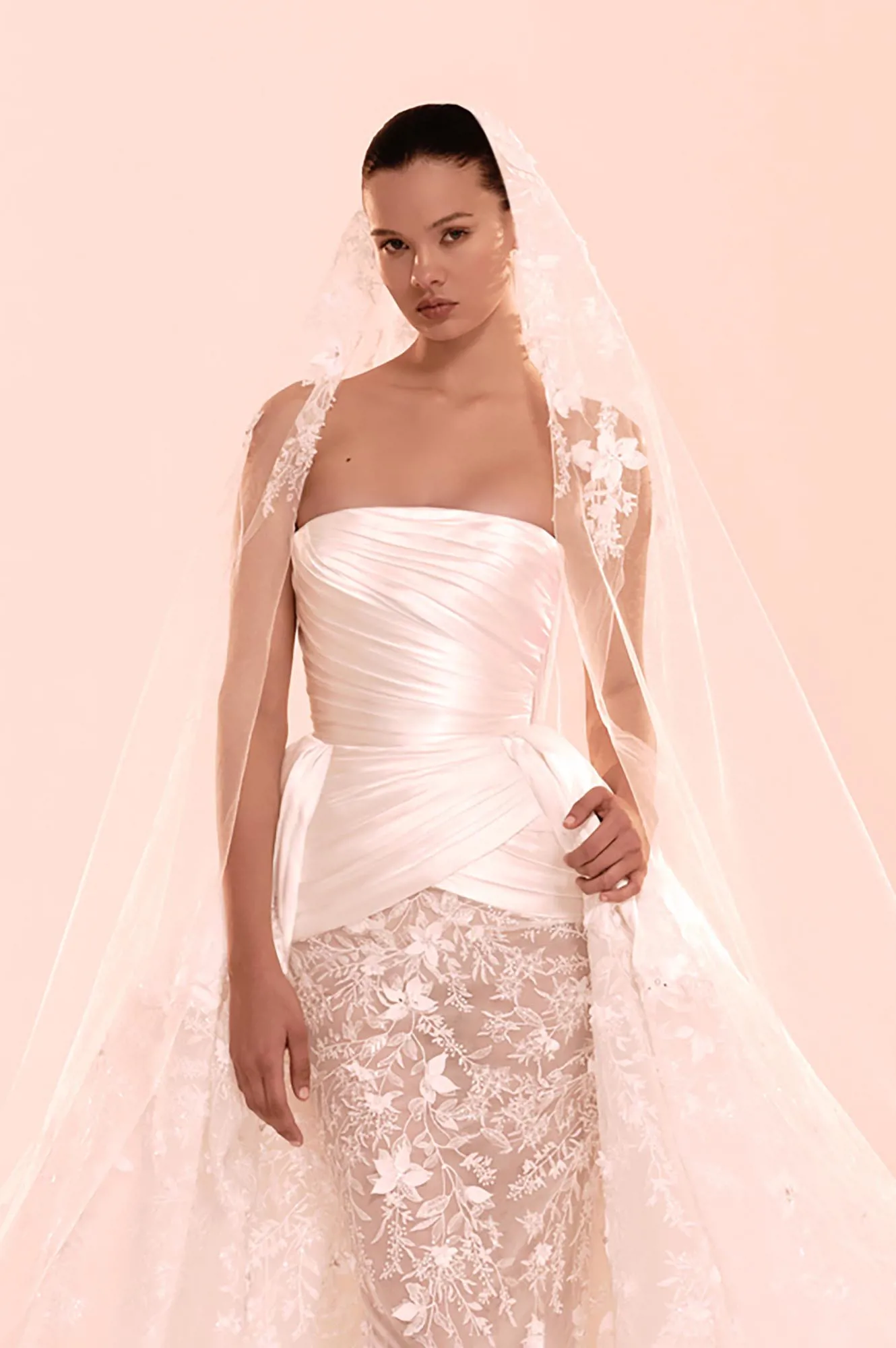 Zuhair Murad Mariage Fall 2026 Look 23 strapless wedding dress with draped satin bodice, lace skirt and floral veil