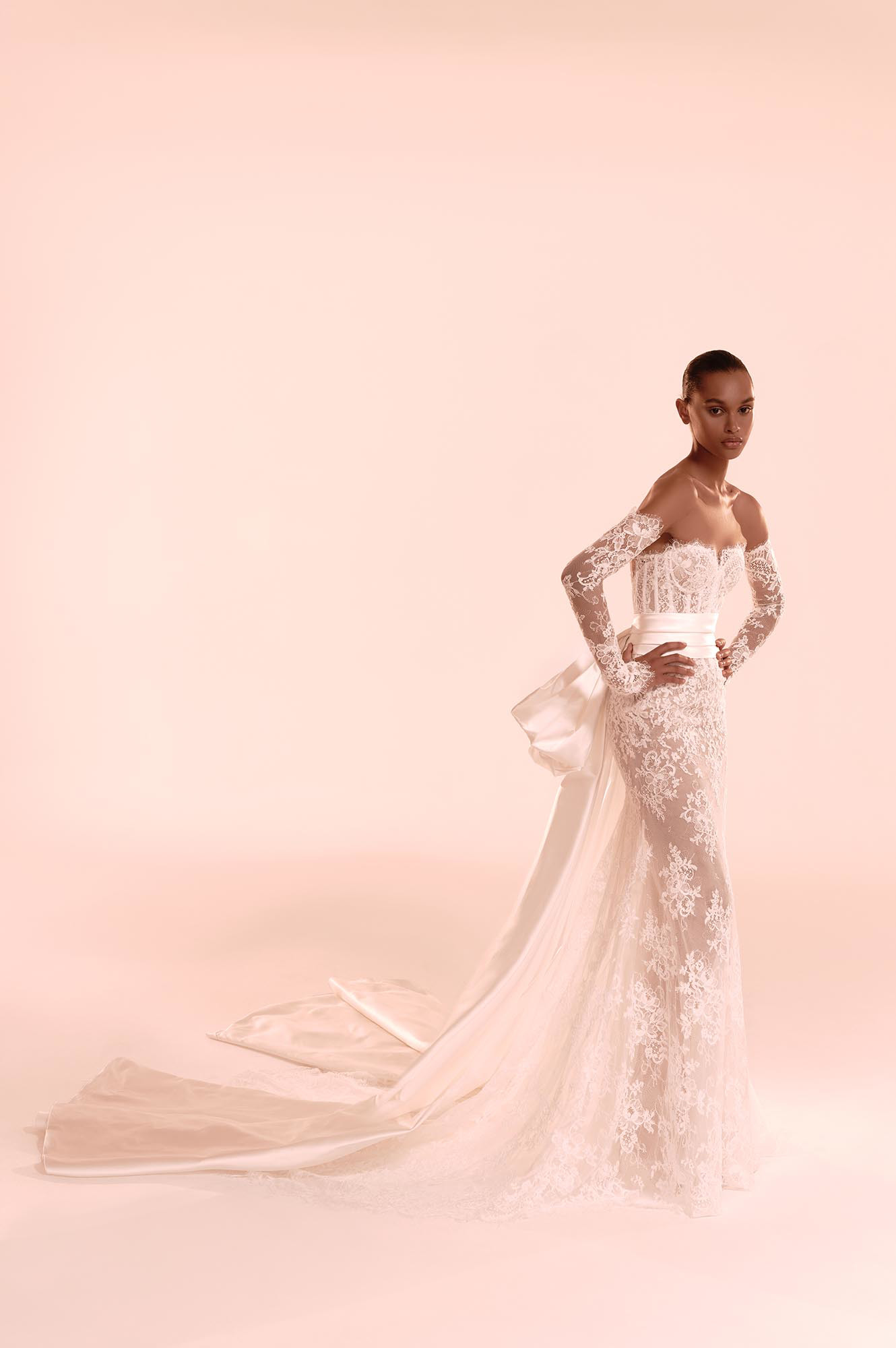 Zuhair Murad Mariage Fall 2026 Look 1 feathered wedding dress with off-shoulder neckline, sheer skirt and sparkling embellishments