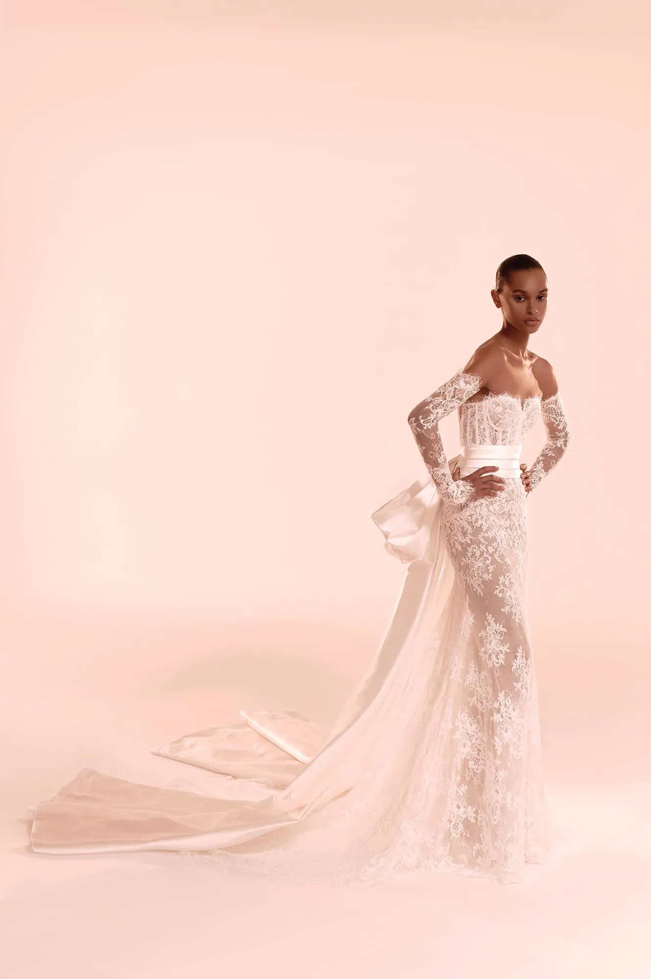Zuhair Murad Mariage Fall 2026 Look 1 feathered wedding dress with off-shoulder neckline, sheer skirt and sparkling embellishments