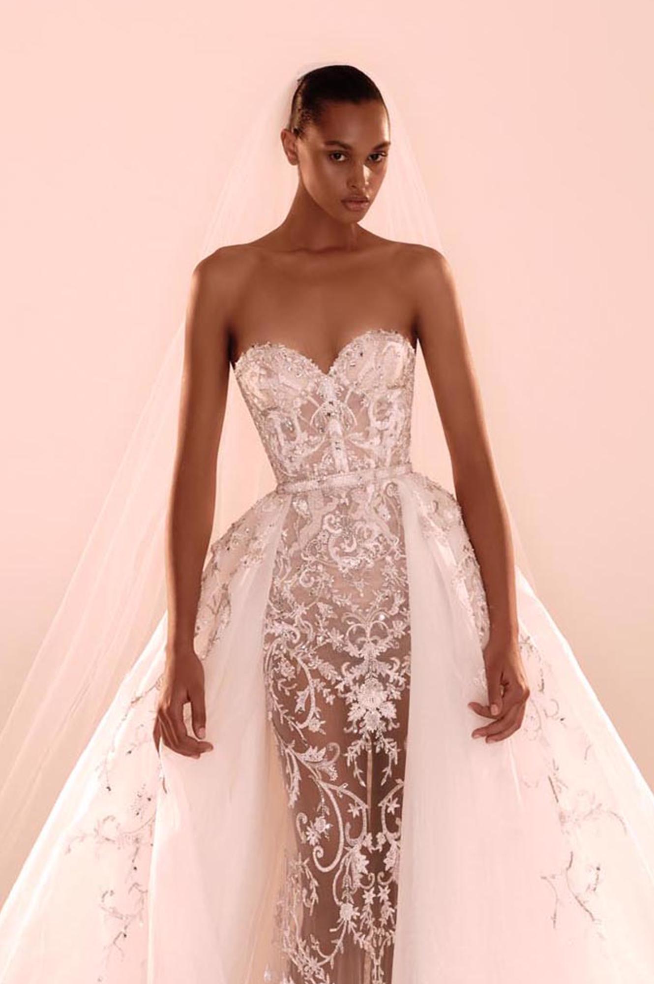 Zuhair Murad Mariage Fall 2026 Look 22 strapless lace wedding dress with embellished corset, detachable overskirt and long veil