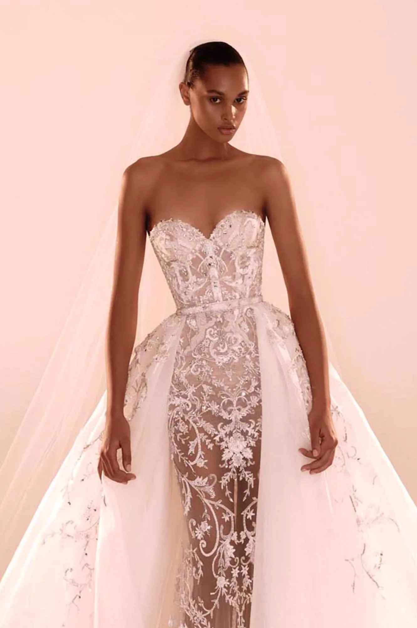 Zuhair Murad Mariage Fall 2026 Look 22 strapless lace wedding dress with embellished corset, detachable overskirt and long veil