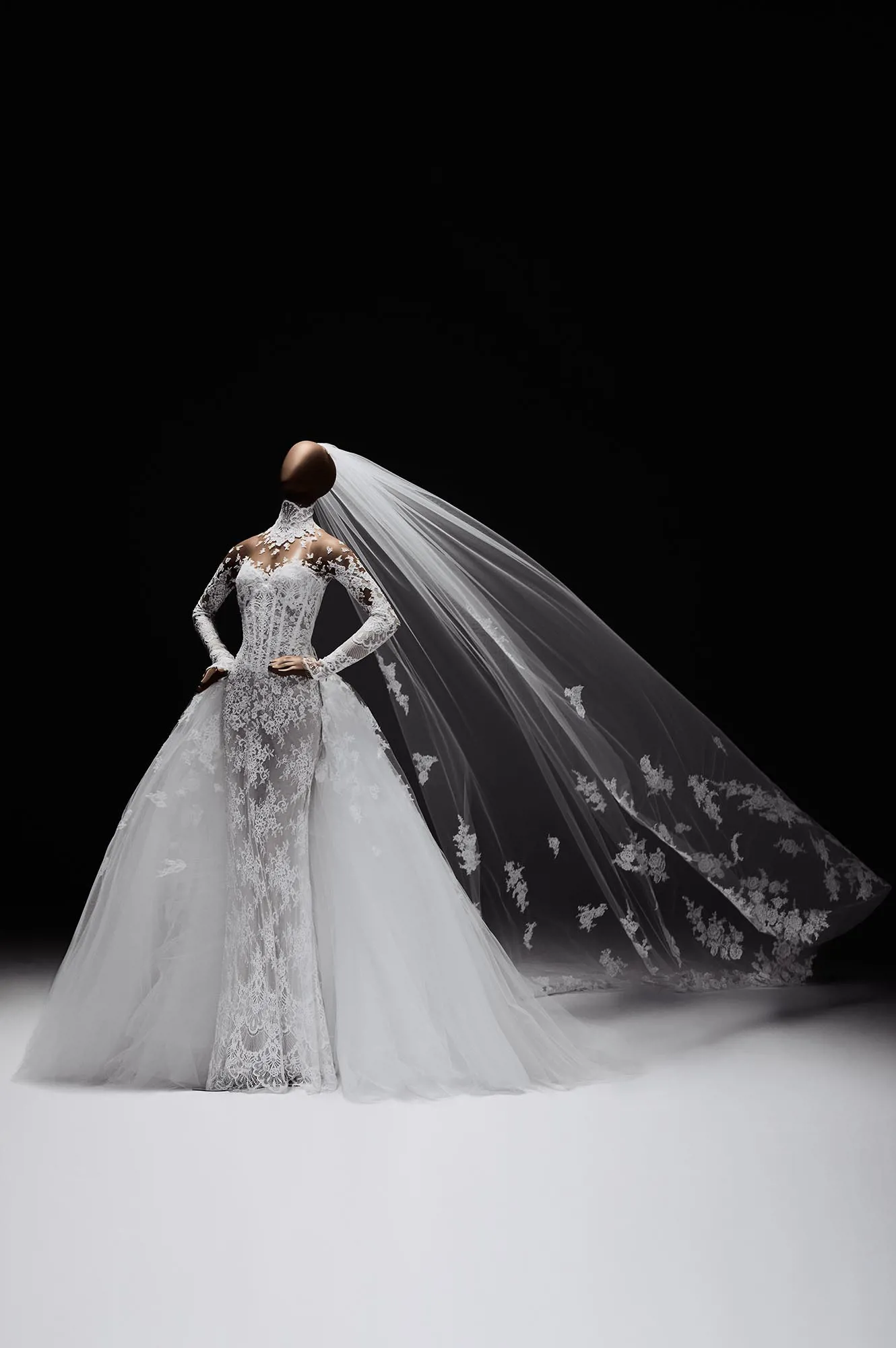 Zuhair Murad Mariage Spring 2027 Look 10 lace wedding dress with long sleeves, full tulle overskirt and floral veil