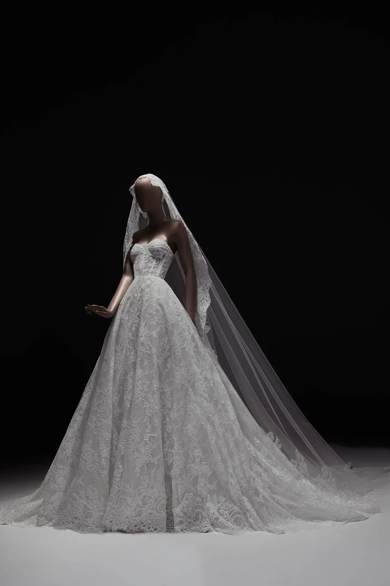 Zuhair Murad Mariage Spring 2027 Look 34 lace ball gown wedding dress with high neckline, long sleeves and dramatic veil