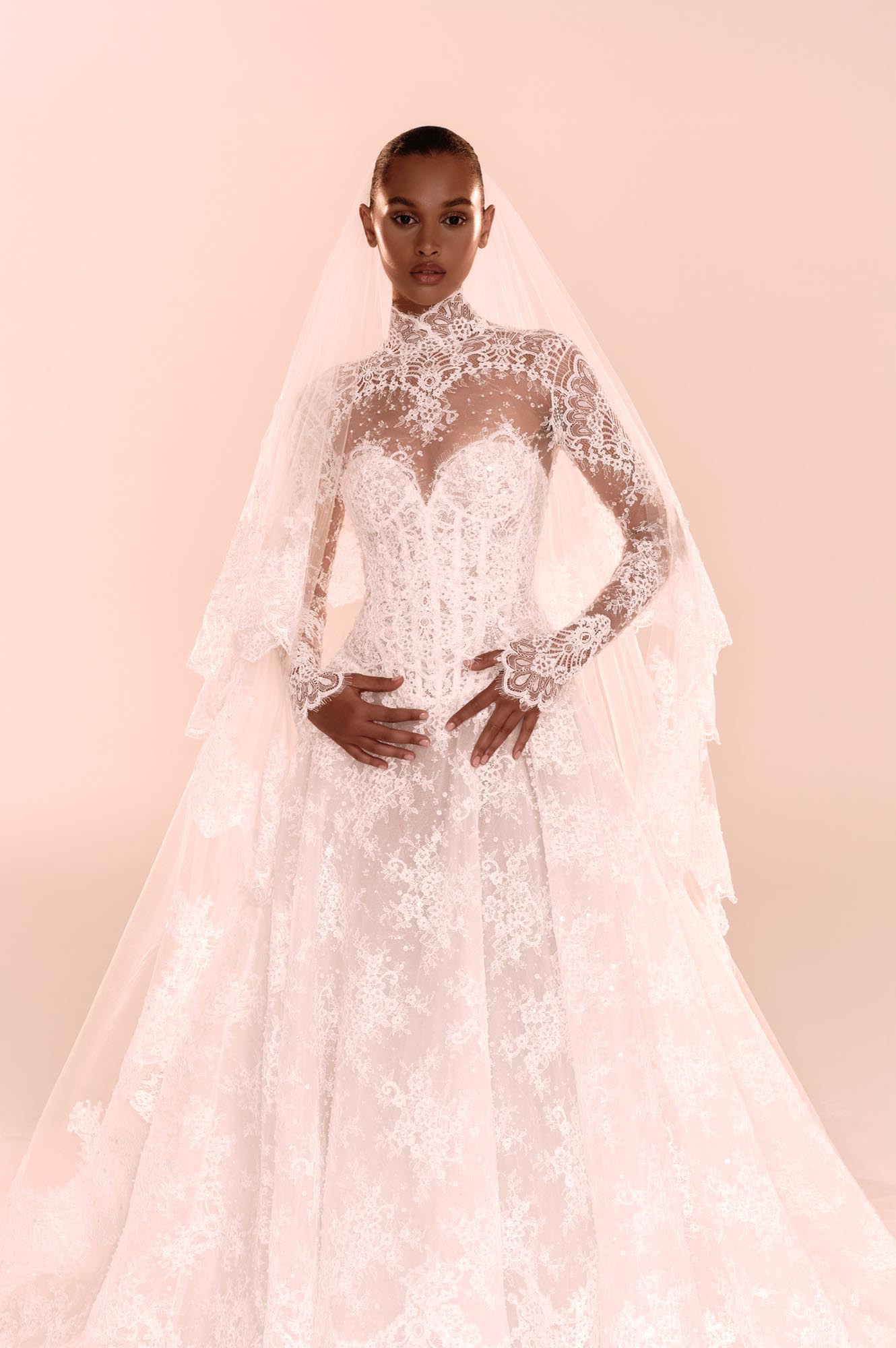 Zuhair Murad Mariage Fall 2026 Look 28 high-neck lace ball gown wedding dress with long sleeves, cathedral veil and embroidered train